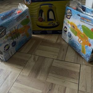 Pool basketball hoop and water guns